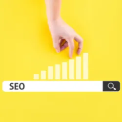 Hand with fingers walking up growing bar chart on top of search bar with SEO typed in.